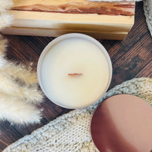 Load image into Gallery viewer, Yellow harp essentials coconut wax candle top view with crackling wood wick in fall background
